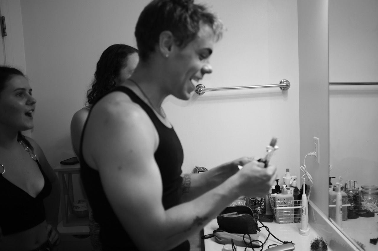 Black and white photo of someone brushing