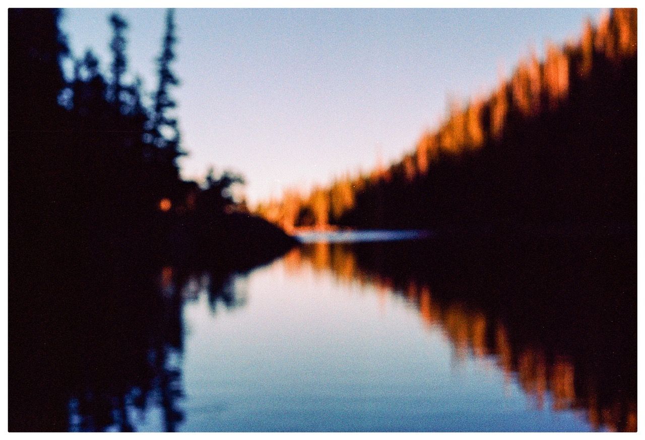 Defocused view of a lake and mountains
